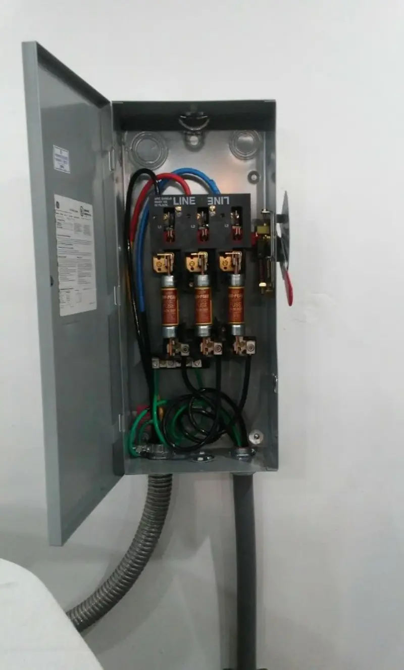 Three-phase disconnect switch installed for Smoke Detector Installation in Neptune
